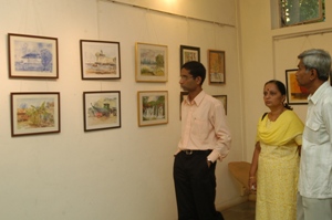 Visitors looking at the artworks at Artfest 09, Indiaart Gallery